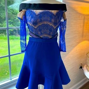 Three Floor Off the Shoulder Flounce Hem Fit and Flare Lace Dress.